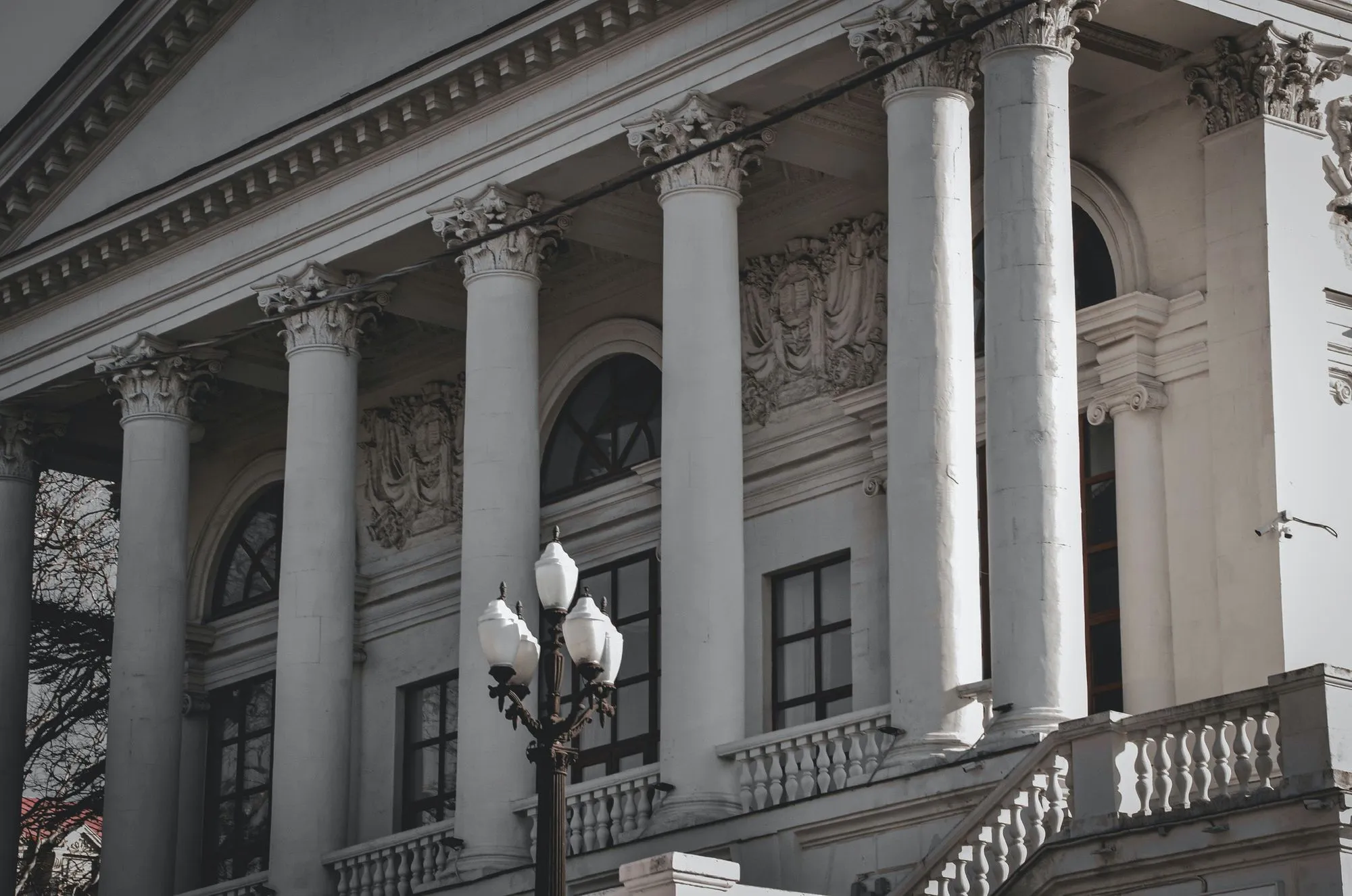 The columned facade of a historic bank building.
